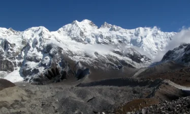 Panoramic view of snow-covered Kanchenjunga from Goechala Trek Viewpoint 1 in Sikkim